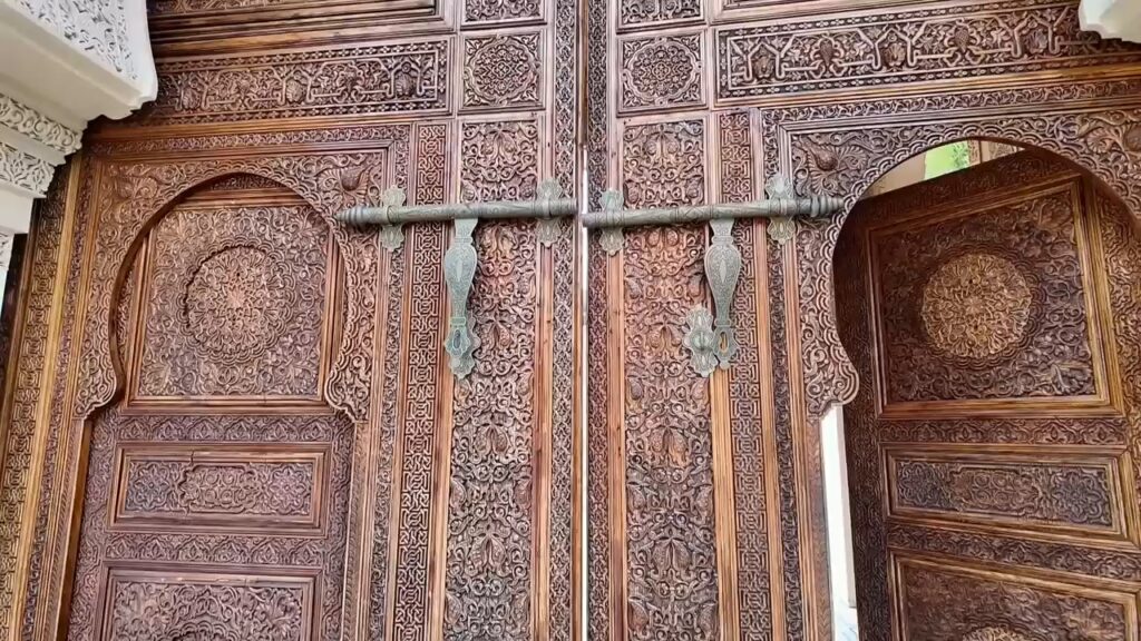 Intricately carved wooden doors at the Moroccan Pavilion