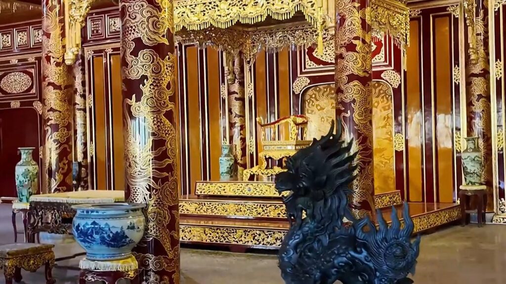 Red and gold throne room inside the Hue Imperial City