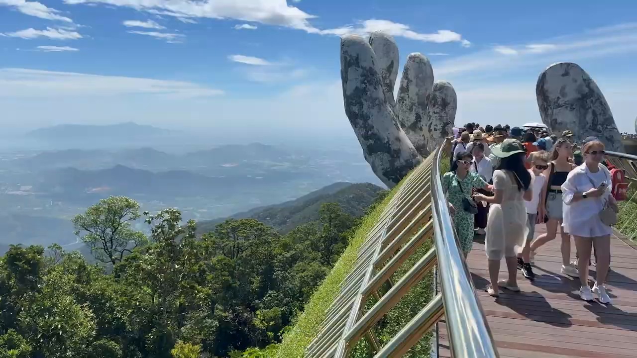 Golden Bridge held up by giant stone hands at Ba Na Hills