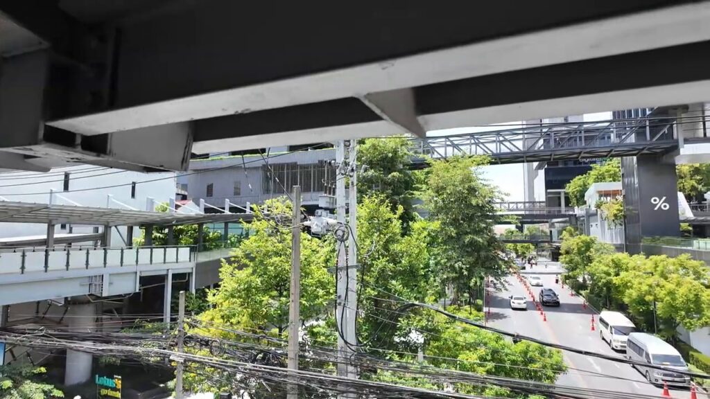 View over Bangkok streets from an elevated BTS walkway