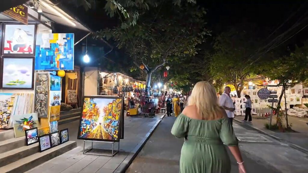 Paintings for sale outside art shops in Hoi An