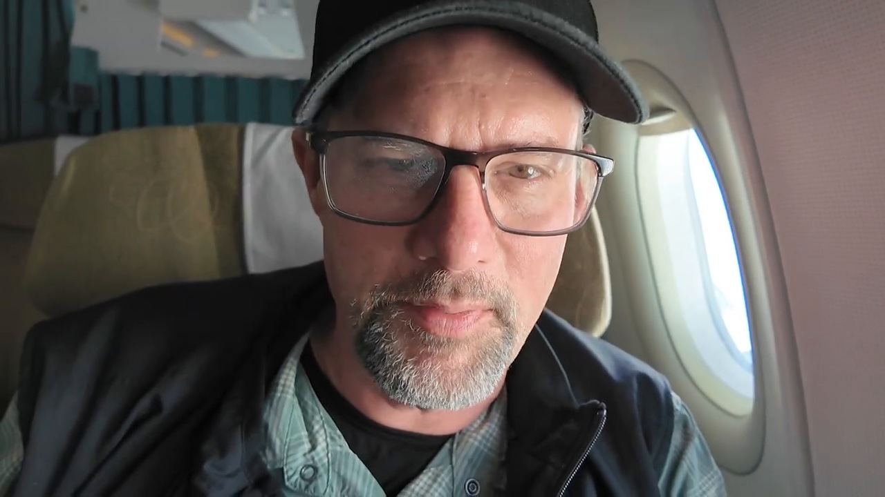 Bill in his Vietnam Airlines business class seat from Da Nang to Bangkok