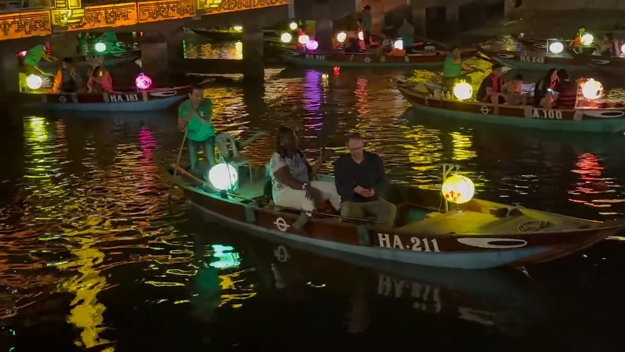 Lantern-lit boats on the Thu Bon River in Hoi An at night