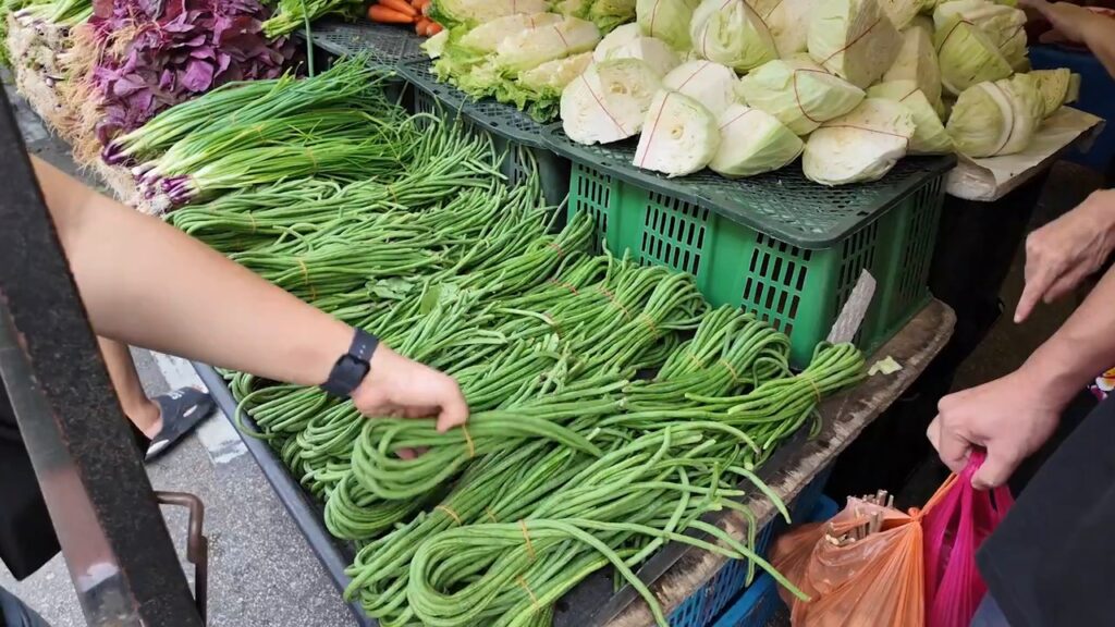 Long snake beans for sale at a Kepong night market stall