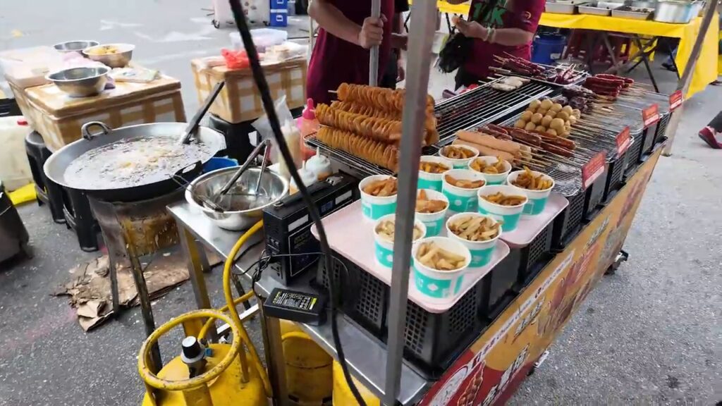 Fried snacks and skewers at a Kepong night market stall