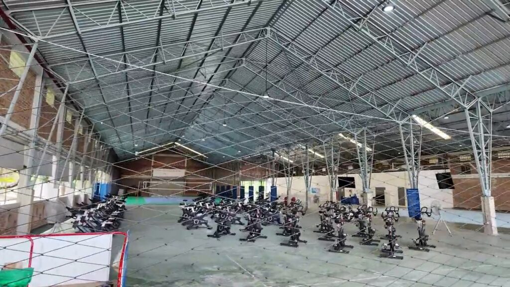 Converted warehouse hall with exercise area at Benjakitti Park