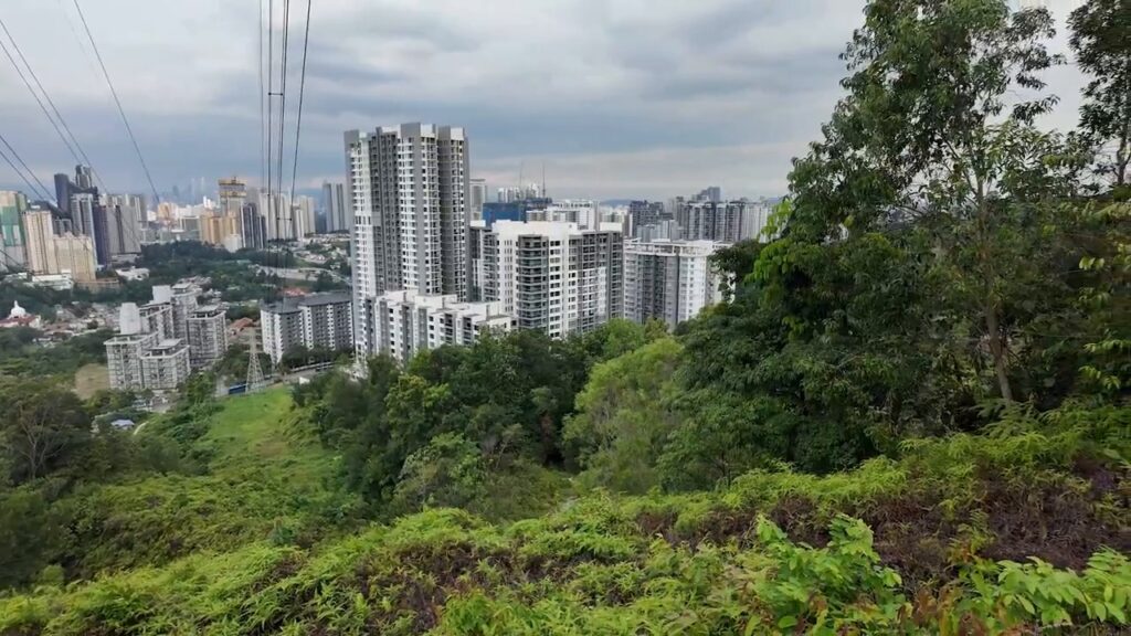 Kuala Lumpur high-rises seen from the Sri Bintang Hill trail