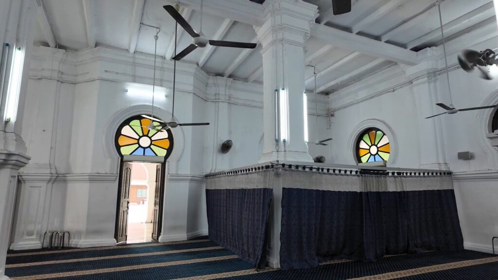 Prayer hall with stained-glass windows at Masjid Panglima Kinta