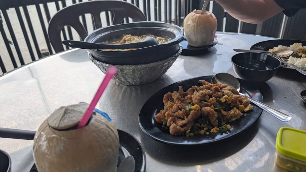 Seafood and coconuts at Rasa Sayang Seafood by the river