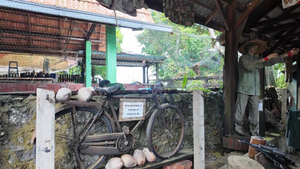Old bicycle and artifacts on display at the Penang War Museum