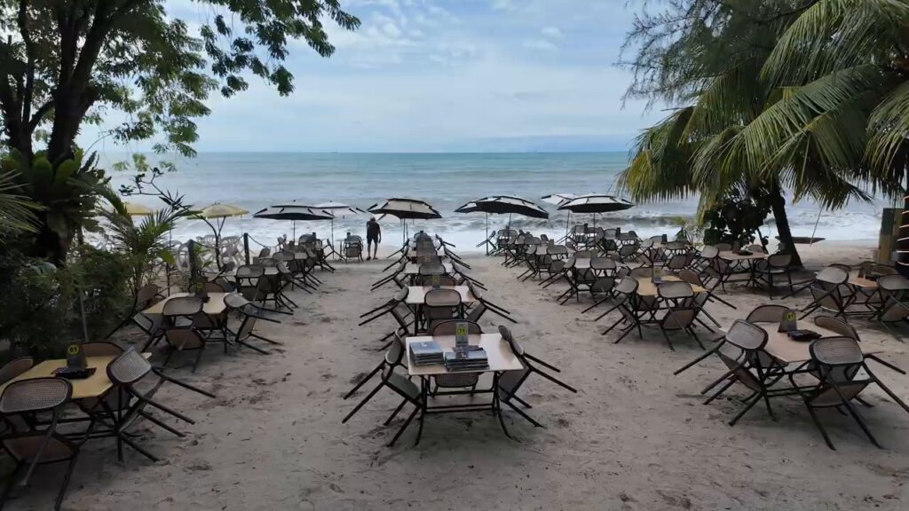 Beachfront tables on the north coast of Penang