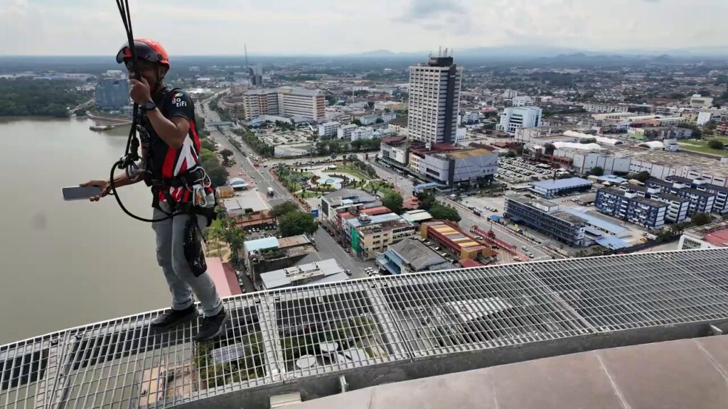 Visitor on the edge walk at Kuantan 188 tower