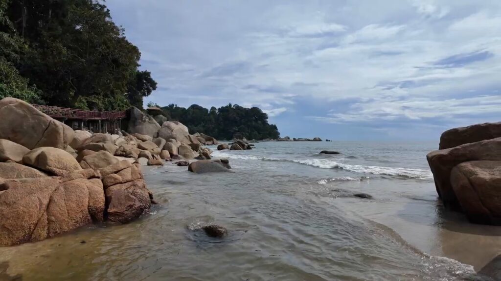 Granite boulders and waves at Teluk Cempedak