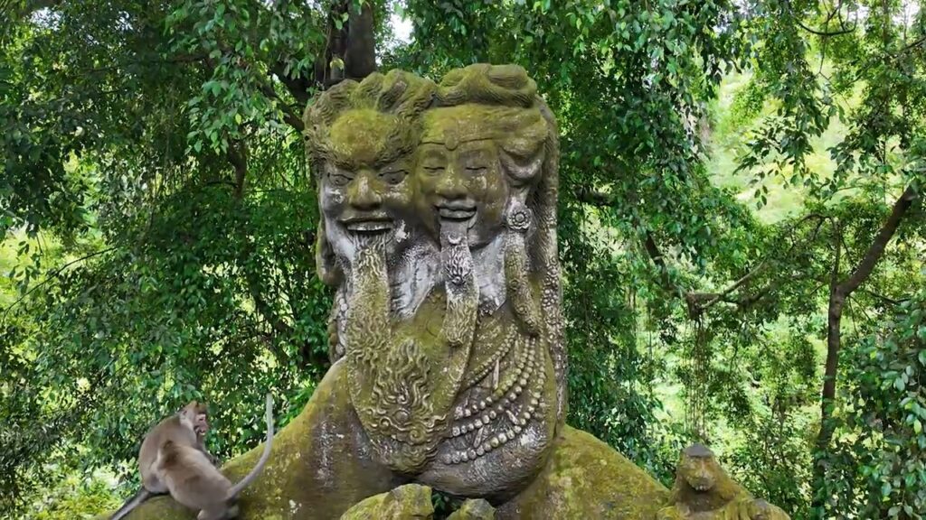 Moss-covered statue at the Sacred Monkey Forest Sanctuary