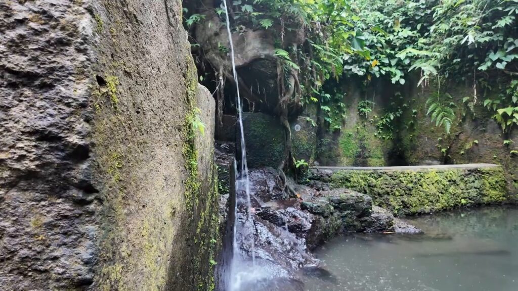 Kanto Lampo Waterfall in a jungle gorge near Ubud