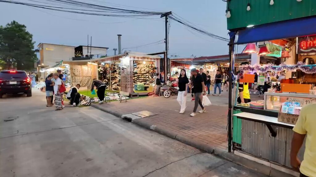 Stalls opening at dusk at the Train Night Market Srinakarin