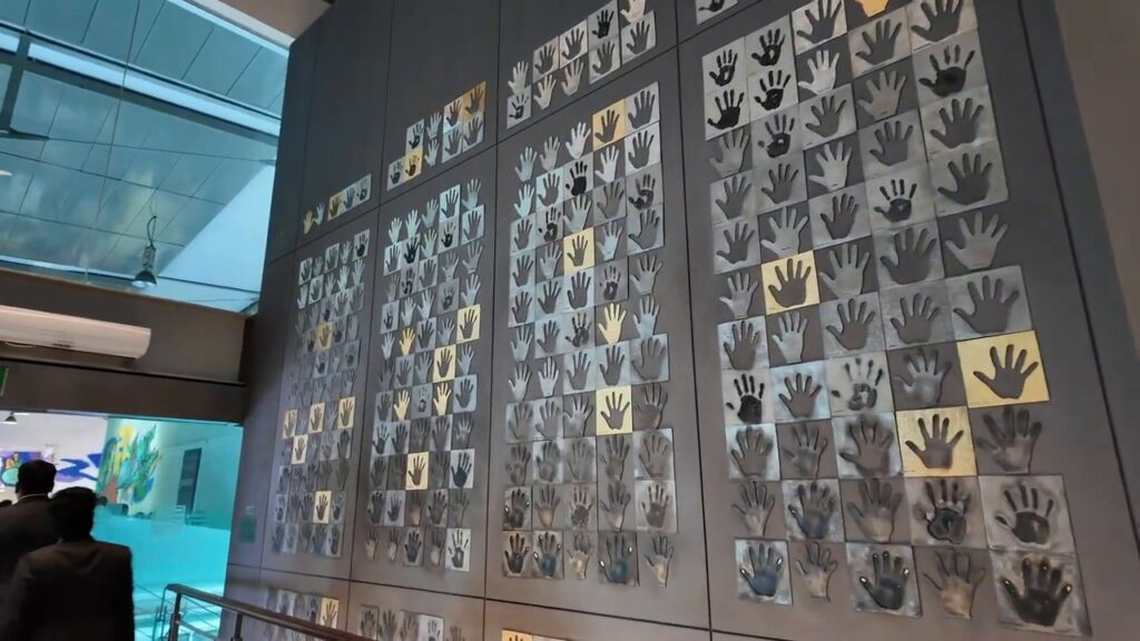 Wall of employee handprints at Royal Selangor