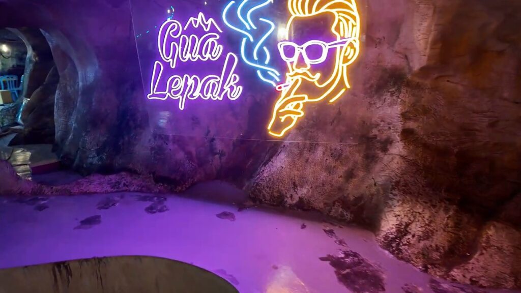 Neon sign at the Gua Lepak cave cafe
